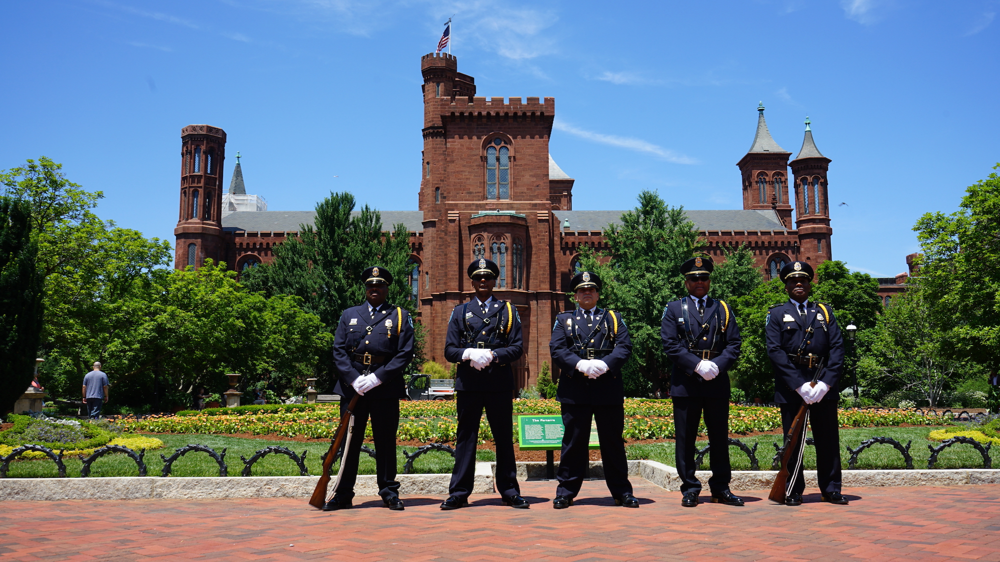 Smithsonian Honor Guard standing in front of the Smithsonian Castle